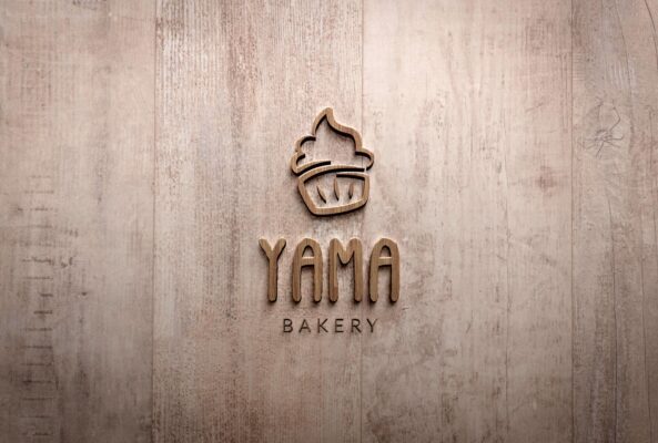 Logo Yama Mockup Wood 2 Enoturistica - Yama Bakery Logo Design