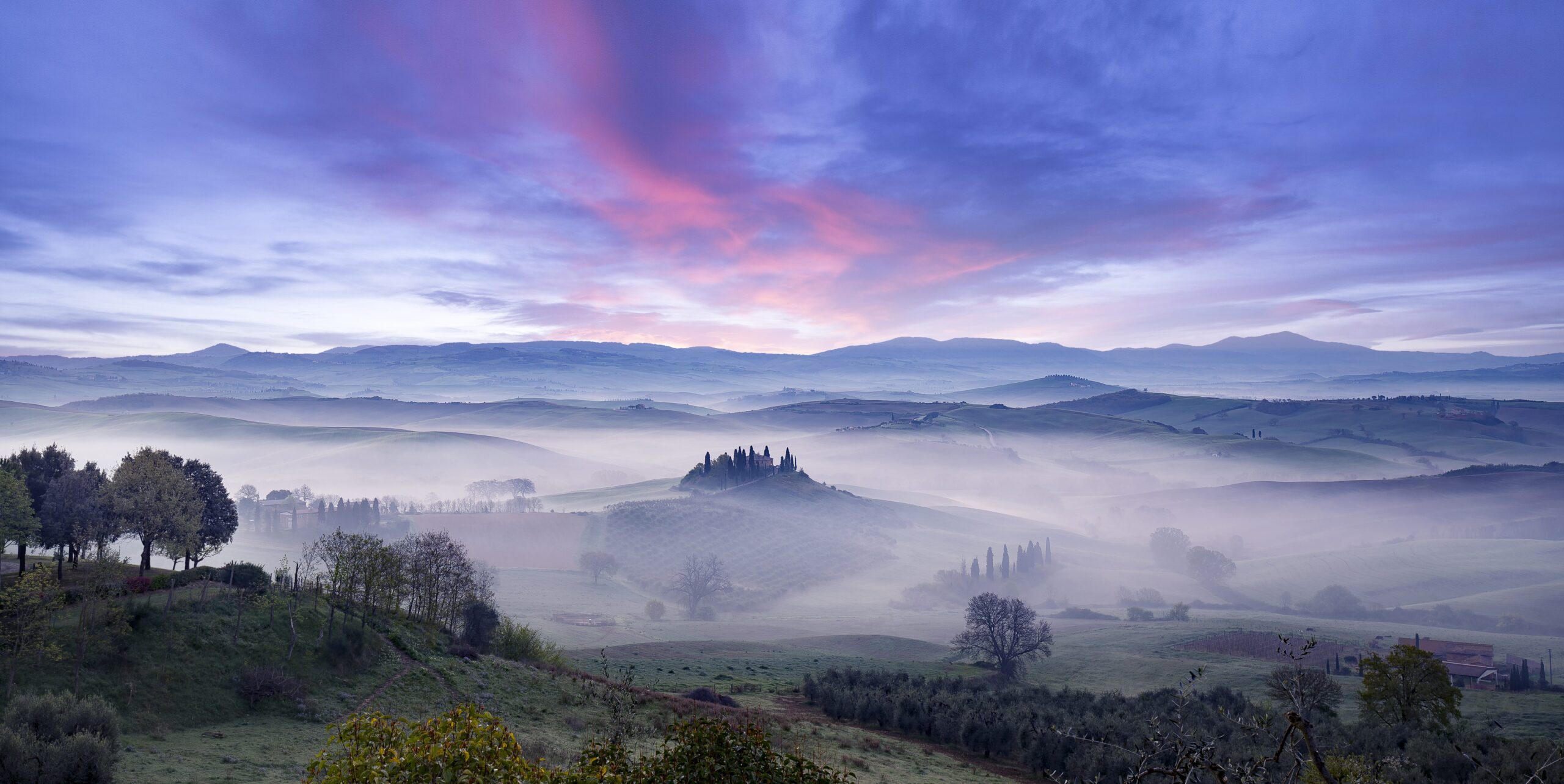 misty morning in tuscan valley